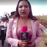 la periodista en un reporte de la marcha en la que fue agredida